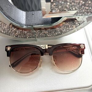 Versace shades with minor scratch on left lens (however you can switch them out)